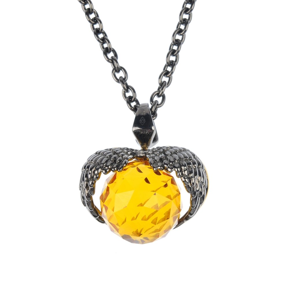 STEPHEN WEBSTER - a silver and Swarovski crystal Virgo : STEPHEN WEBSTER - a silver and Swarovski crystal Virgo 'Astro Ball' pendant, the spherical orange Swarovski crystal, to the textured wing surmount with cubic zirconia detail, suspended from a belcher-