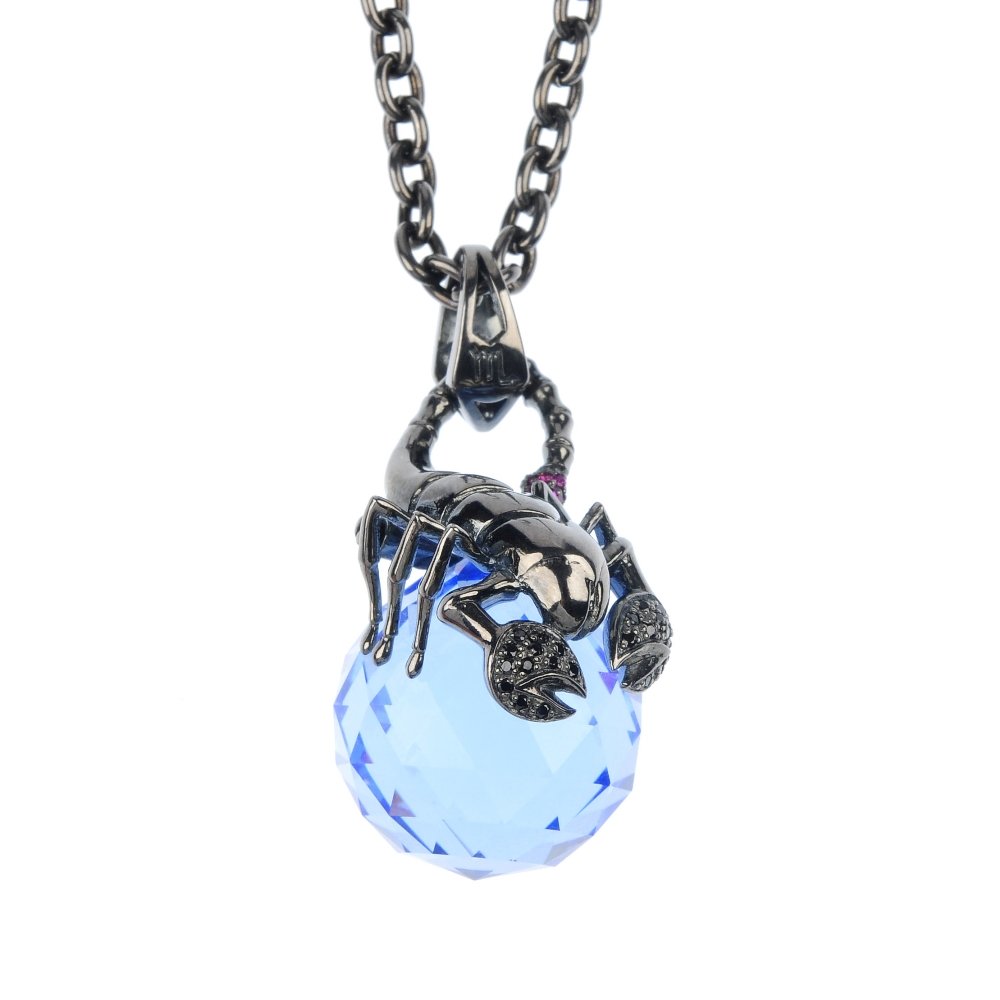STEPHEN WEBSTER - a silver and Swarovski crystal Scorpi: STEPHEN WEBSTER - a silver and Swarovski crystal Scorpio 'Astro Ball' pendant, the spherical blue Swarovski crystal, to the scorpion surmount with black diamond detail, suspended from a belcher-link c