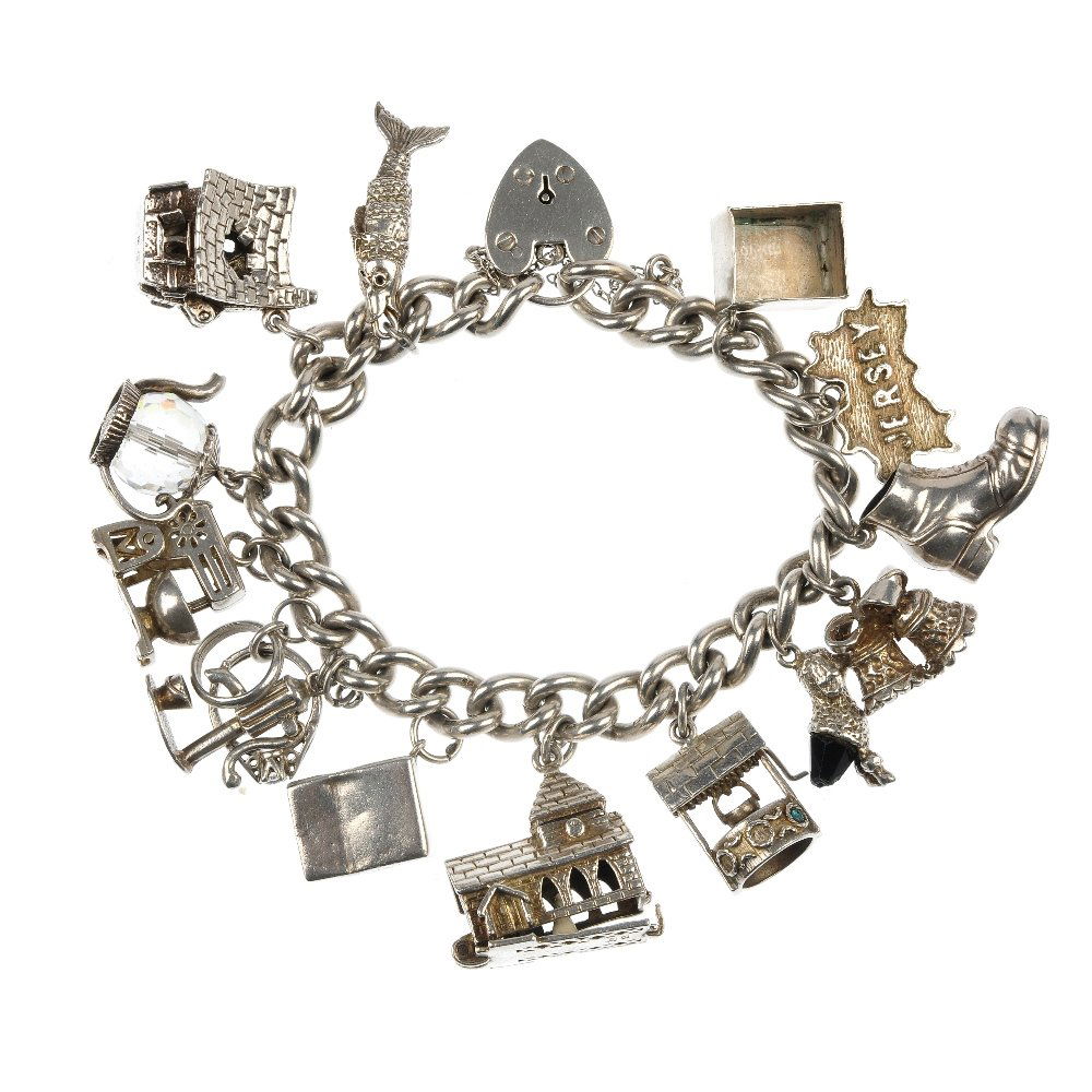 A selection of three silver charm bracelets.: A selection of three silver charm bracelets. The curb and circular-link bracelets, suspending a total of thirty-two charms, to include a haunted house and a wishing well. Three charms AF. One clasp de