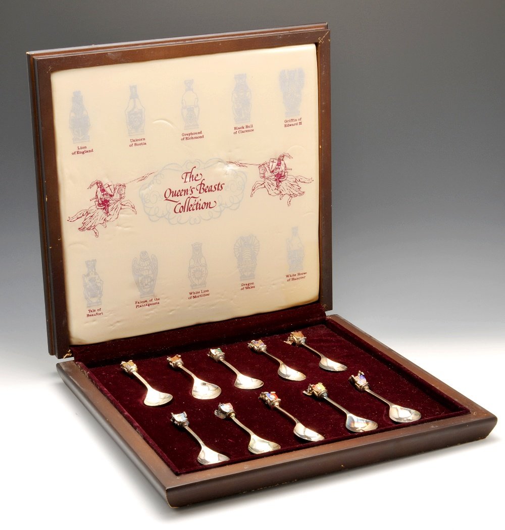 A modern cased set of silver Queen's Beasts spoons.: A modern cased set of silver Queen's Beasts spoons, each with a part enamelled differing heraldic terminal depicting the genealogy of Queen Elizabeth II. Hallmarked Toye, Kenning & Spencer, Birmingham