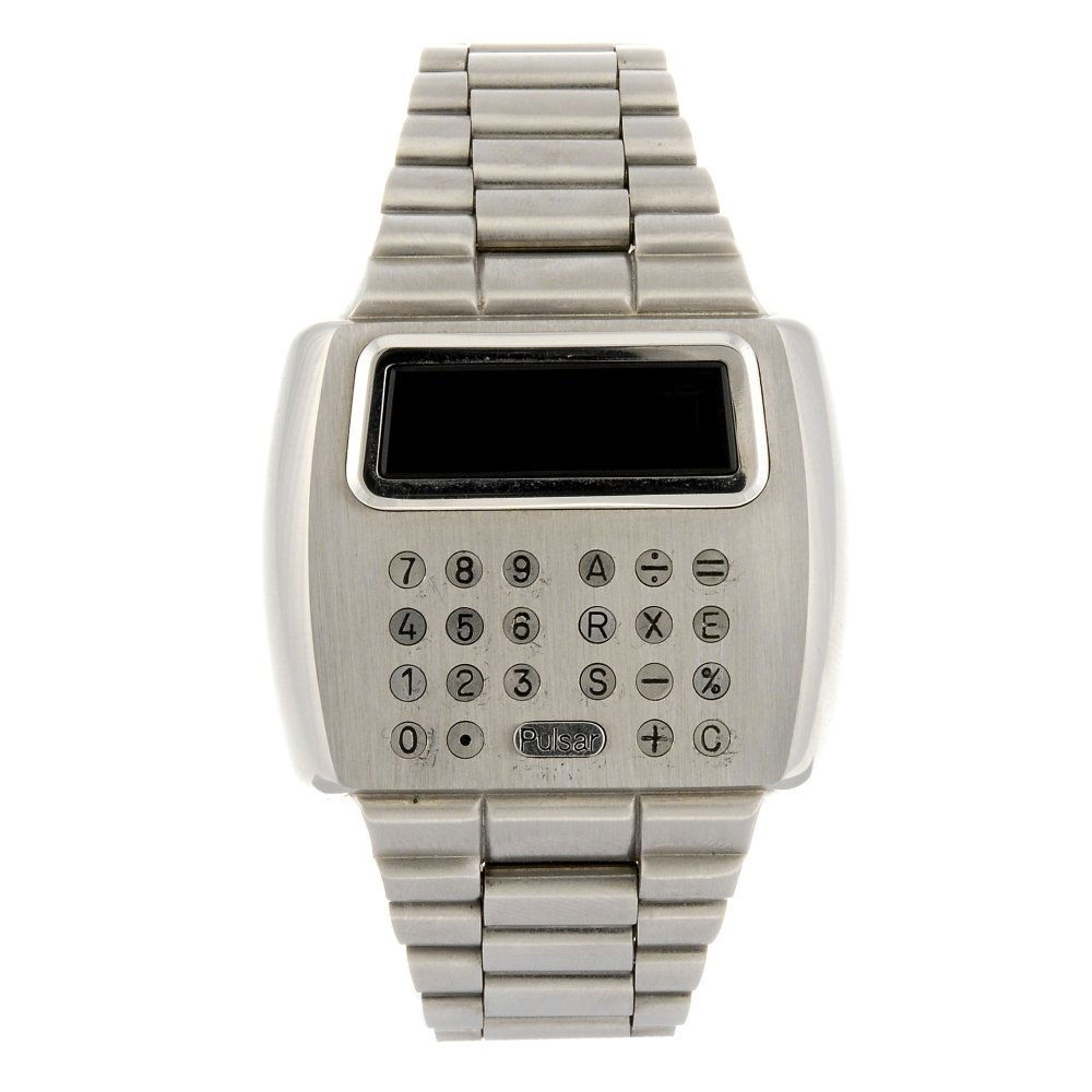 A stainless steel electronic gentleman's Pulsar: A stainless steel electronic LED digital gentleman's Pulsar calculator bracelet watch, the digital display to twelve o'clock with calculator keypad, tonneau shaped case numbered 15620, fitted to an au