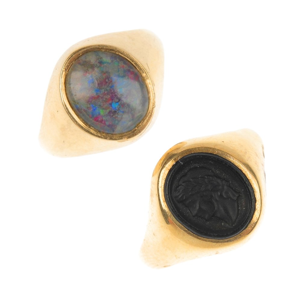 A selection of three 9ct gold rings.: A selection of three 9ct gold rings. To include an opal triplet ring, a black glass cameo ring and an orange paste ring. Hallmarks for London and Birmingham. Weight 14.2gms.
