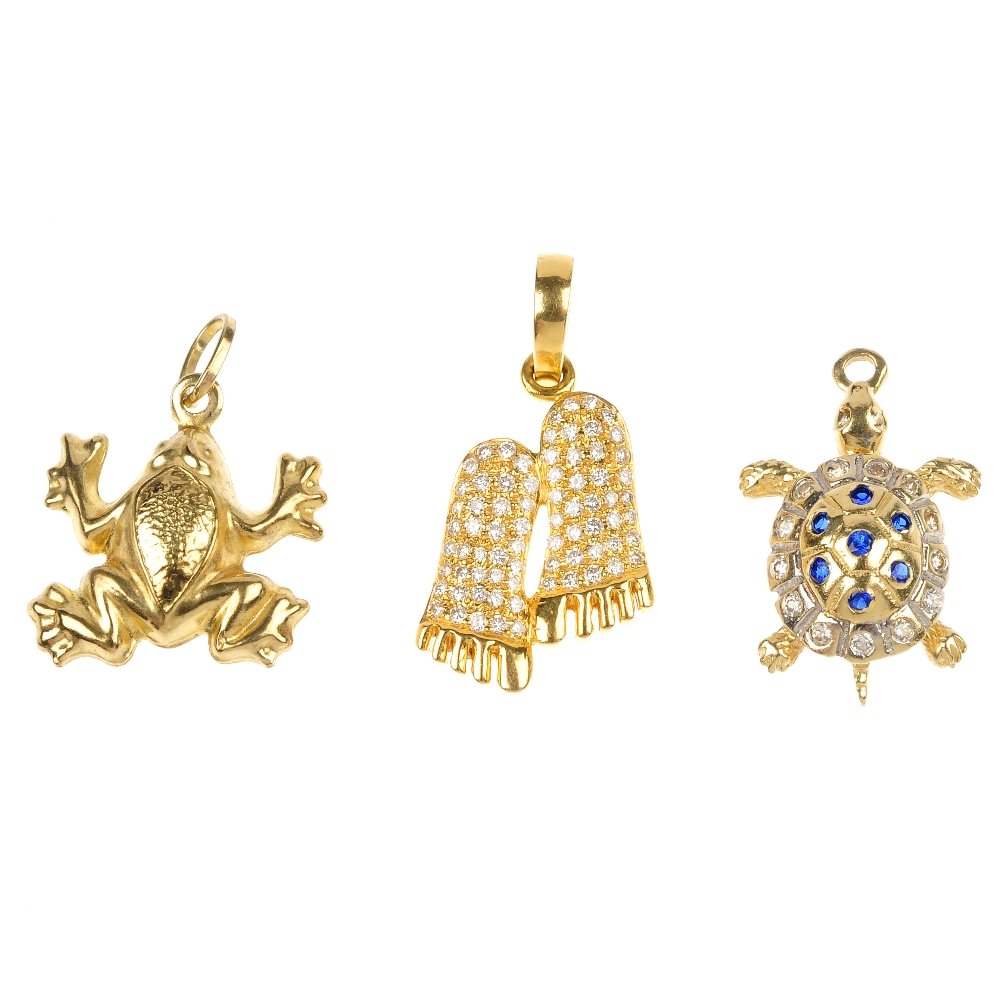 A selection of twenty-one pendants and charms.: A selection of twenty-one pendants and charms. To include a Links of London silver boot charm, a brilliant-cut diamond pair of feet pendant, together with nineteen other examples. Two with hallmarks f
