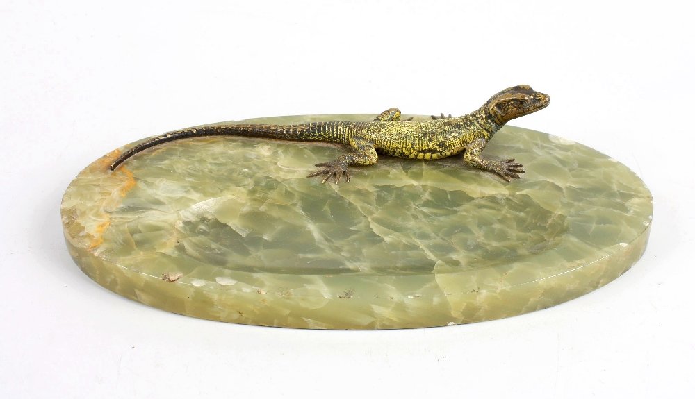 Attributed to Franz Bergman, (1861-1936): Attributed to Franz Bergman, (1861-1936). An Art Deco green onyx oval desk stand pen tray, surmounted by a cold painted bronze figure of a lizard. 9 3/4" (24.8cm) wide.