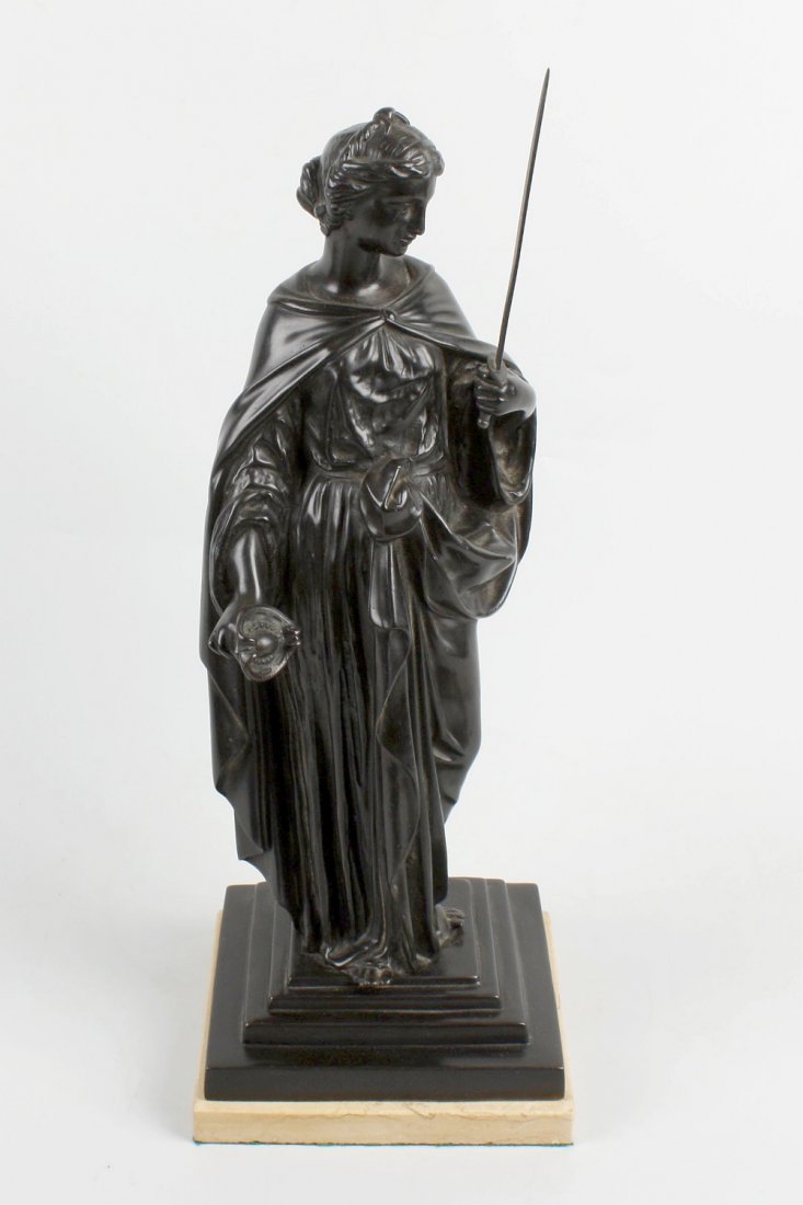 A late 19th Century bronze figure: A late 19th Century bronze figure modelled as a female dressed in flowing robes holding aloft a sword, the whole upon a stepped base terminating in an alabaster plinth, 16" (40.5cm) high.
