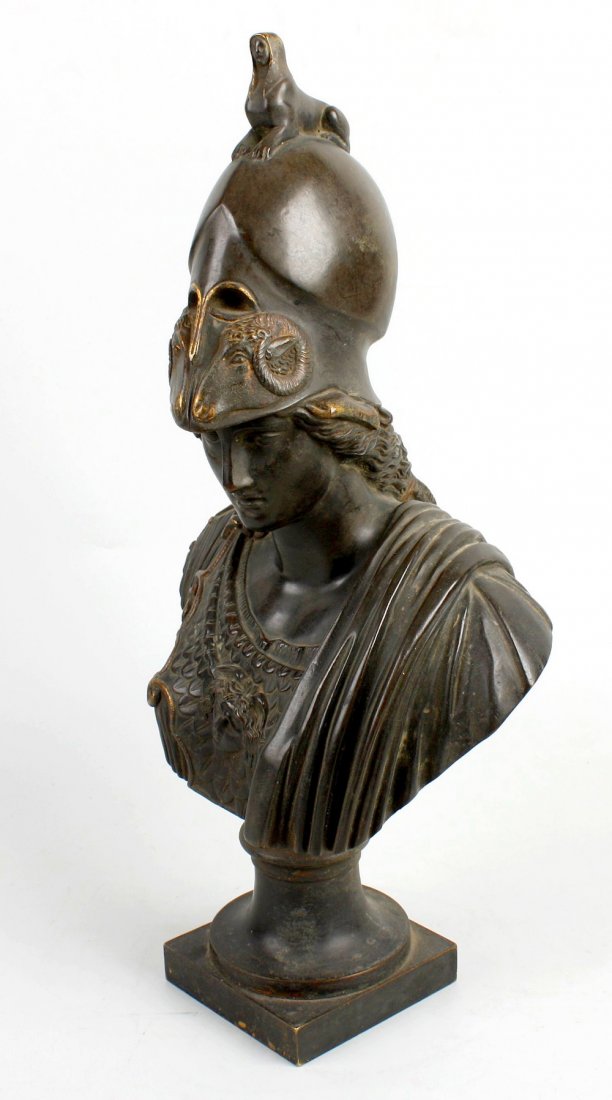 A 19th century patinated bronze bust of Athena (Minerva: A 19th century patinated bronze bust of Athena (Minerva) GiustinianiAfter the Antique, the figure wearing a military uniform with ram- and sphinx-decorated helmet, 15 1/2" (39.5cm) high.Literature: Fr
