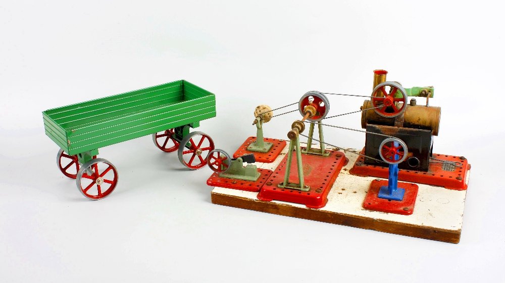A box containing a Mamod OW1 metal bodied open wagon an: A box containing a Mamod OW1 metal bodied open wagon in original box, a Mamod Live Steam stationary model steam engine and four accessory tools