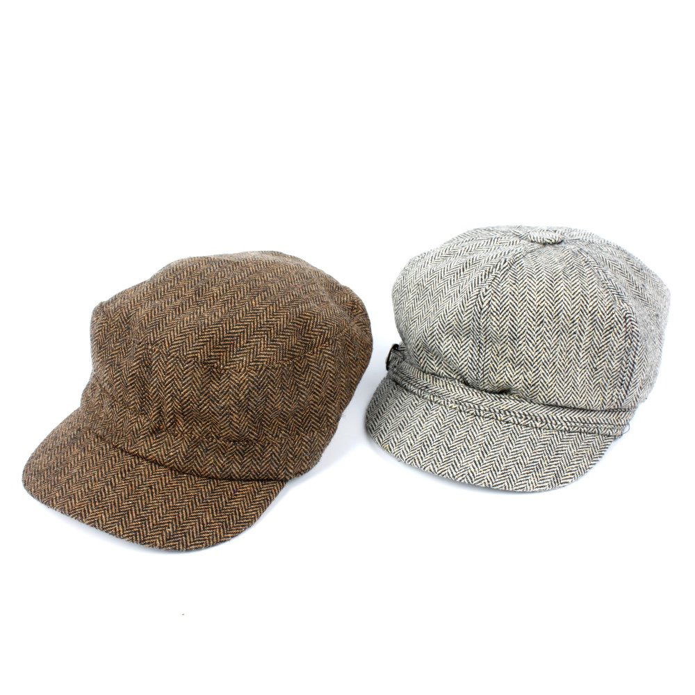 Four soft peaked caps: Four soft peaked caps of similar design, to include three gatsby style caps, two with herringbone pattern, one grey and one made of brown fleece, together with a black felt Marc Taylor beret cap.