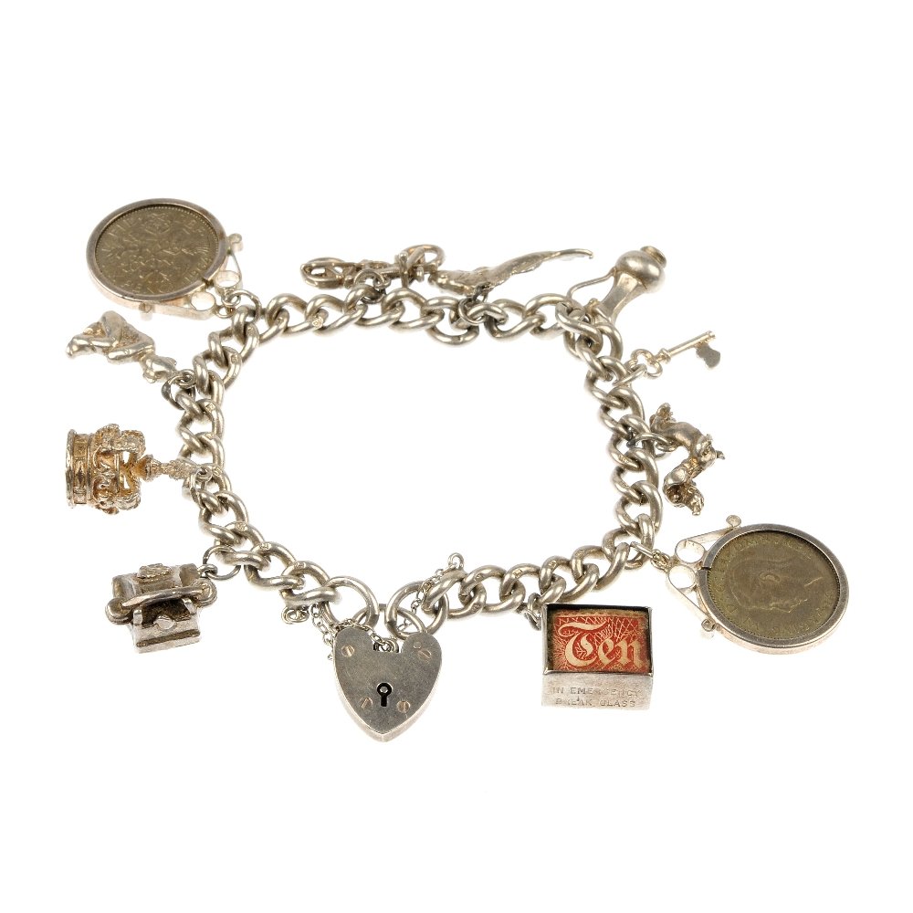 Three charm bracelets.: Three charm bracelets. To include a silver bracelet, suspending eleven charms, to include a bike and a dachshund, together with two further charm bracelets. Two bracelet with hallmarks for silver. Tot