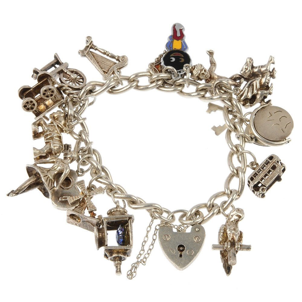 Two white metal charm bracelets.: Two white metal charm bracelets. To include a curb-link bracelet suspending sixteen charms, together with a similar bracelet suspending nine charms. Length 17.5cms. Total weight 104.4gms.