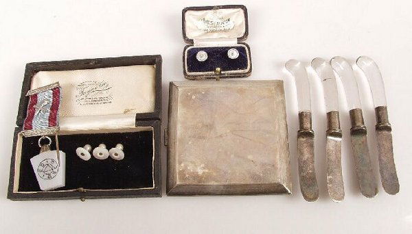 Cased set of two 9ct gold dress studs, t: Cased set of two 9ct gold dress studs, three other styds, a silver cigarette case, a Masonic fob and four glass handled knives.