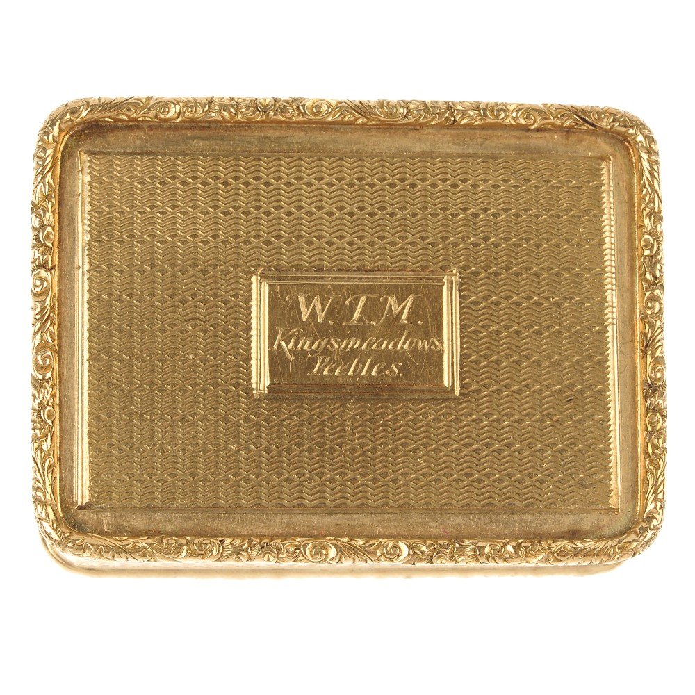 An early 20th century 9ct gold pill box.: An early 20th century 9ct gold pill box. Of rectangular-shape outline, the central cartouche, engraved to read 'WTM Kingsmeadow peebles', within and engine turned surround, to the scroll embossed bord