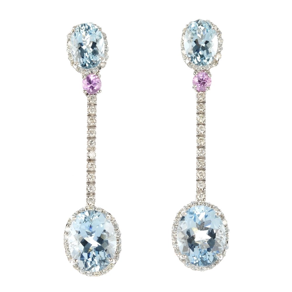 A pair of aquamarine and sapphire ear pendants.: A pair of aquamarine and sapphire ear pendants. Each designed as an oval-shape aquamarine and brilliant-cut diamond cluster, suspended from a brilliant-cut diamond line, to the similarly-set aquamarin