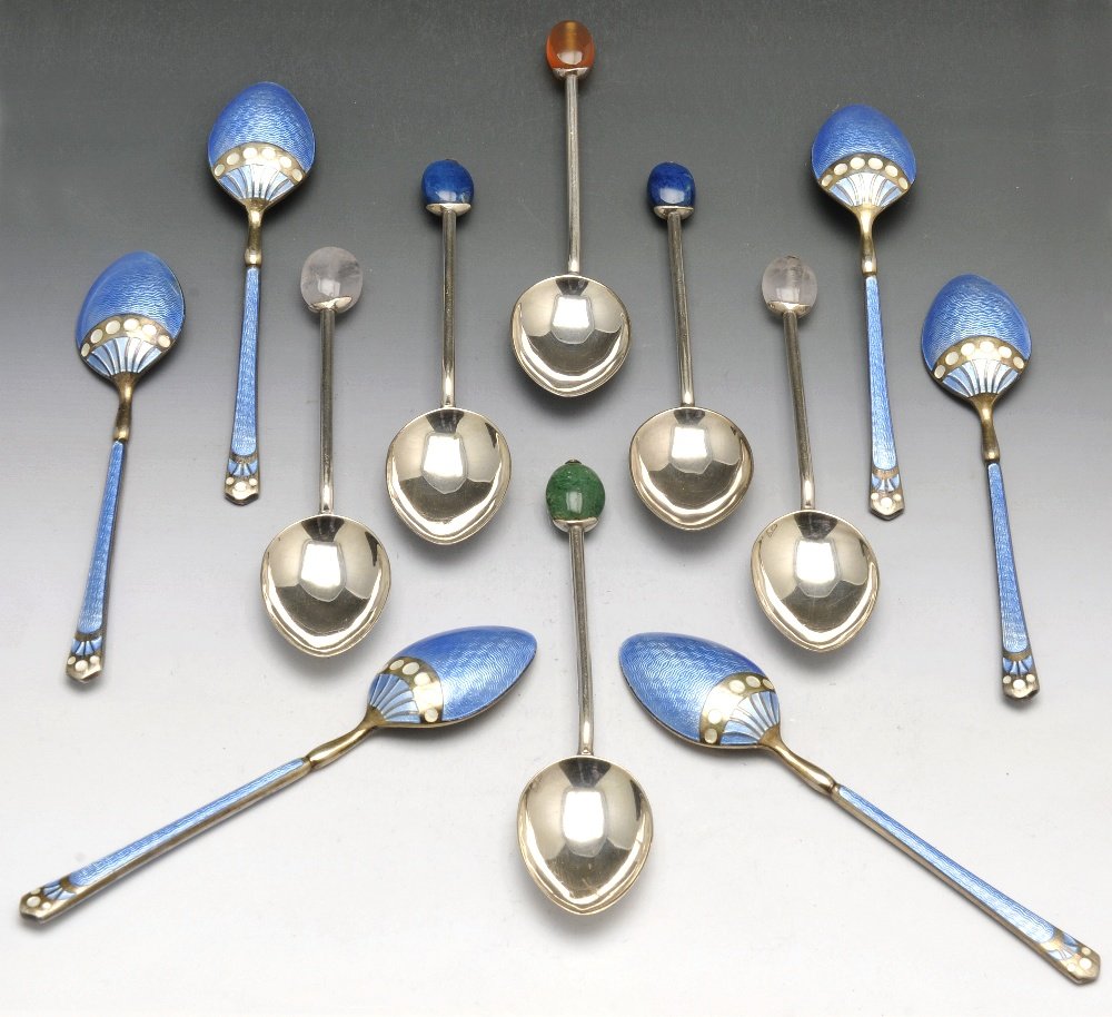 A selection of cased cutlery and flatware.: A selection of cased cutlery and flatware to include a 1920's set of six silver teaspoons, each with plain bowl and stem leading to a coloured stone finial, hallmarked Liberty & Co Ltd, Birmingham 192