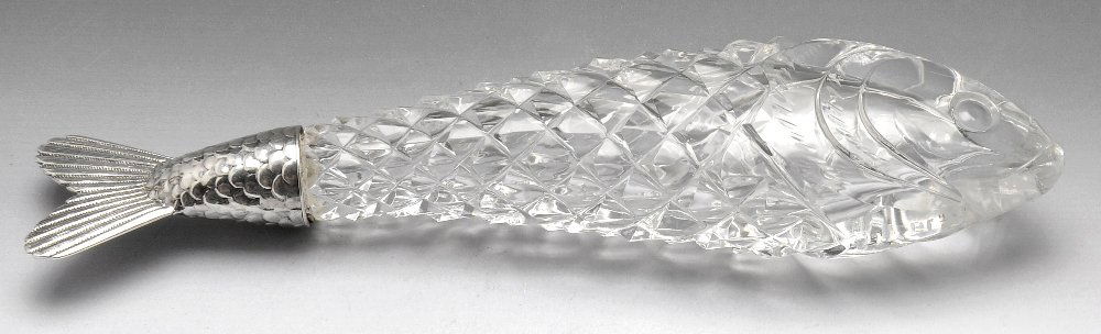 A Victorian Thomas Webb & Sons novelty fish scent: A Victorian Thomas Webb & Sons silver mounted cut glass novelty fish scent bottle by Sampson Mordan & Co, with realistically modelled screw down silver tail. Hallmarked Sampson Mordan & Co, London 188