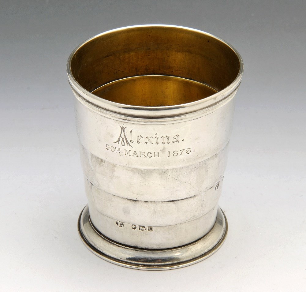 A Victorian silver hunting cup.: A Victorian silver hunting cup of tapered collapsible form with silver-gilt interior, personal inscription and in original case. Hallmarked Thomas Johnson I, London 1874. Maximum height measuring 2 1/