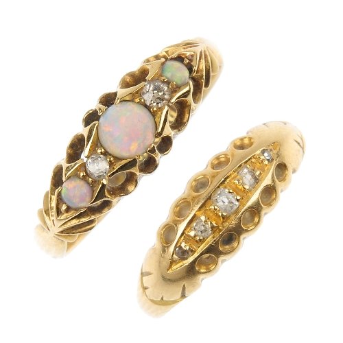 Two early 20th century 18ct gold diamond and gem rings.: Two early 20th century 18ct gold diamond and gem rings. To include an Edwardian graduated circular opal cabochon three-stone ring with single-cut diamond spacers, together with a single-cut diamond fi