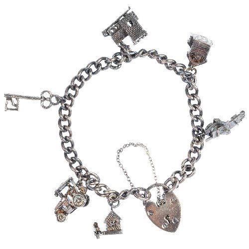 Four charm bracelets.: Four silver and white metal charm bracelets and charms, the curb-link bracelets suspending a total of thirty-six charms, to include a train station, an alarm clock and a cannon, to their heart padlock