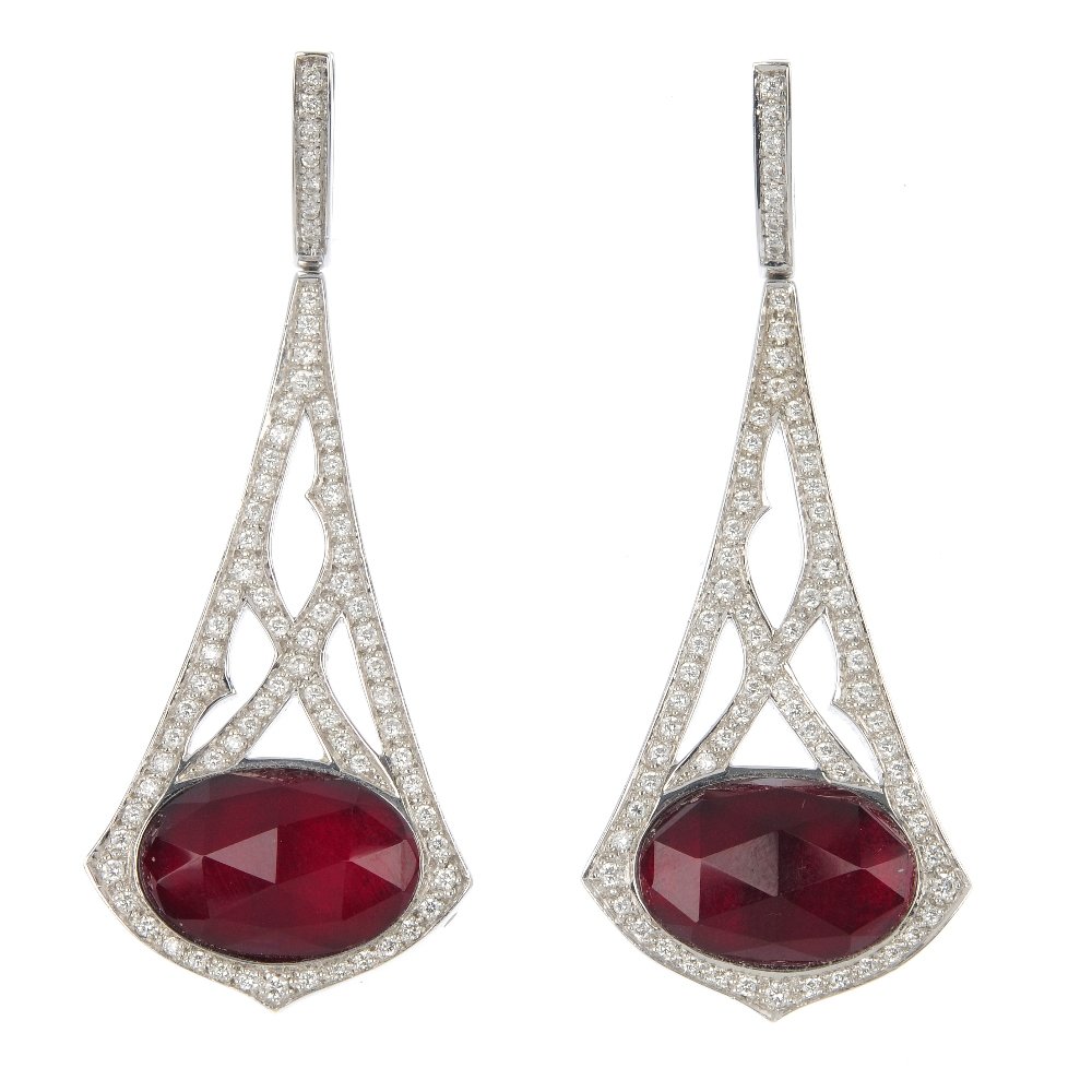 STEPHEN WEBSTER- a pair of 18ct gold garnet, rock cryst: * STEPHEN WEBSTER- a pair of 18ct gold garnet, rock crystal and diamond 'Crystal Haze' ear pendants. Each designed as an oval garnet panel with faceted rock crystal top, within a brilliant-cut diamond