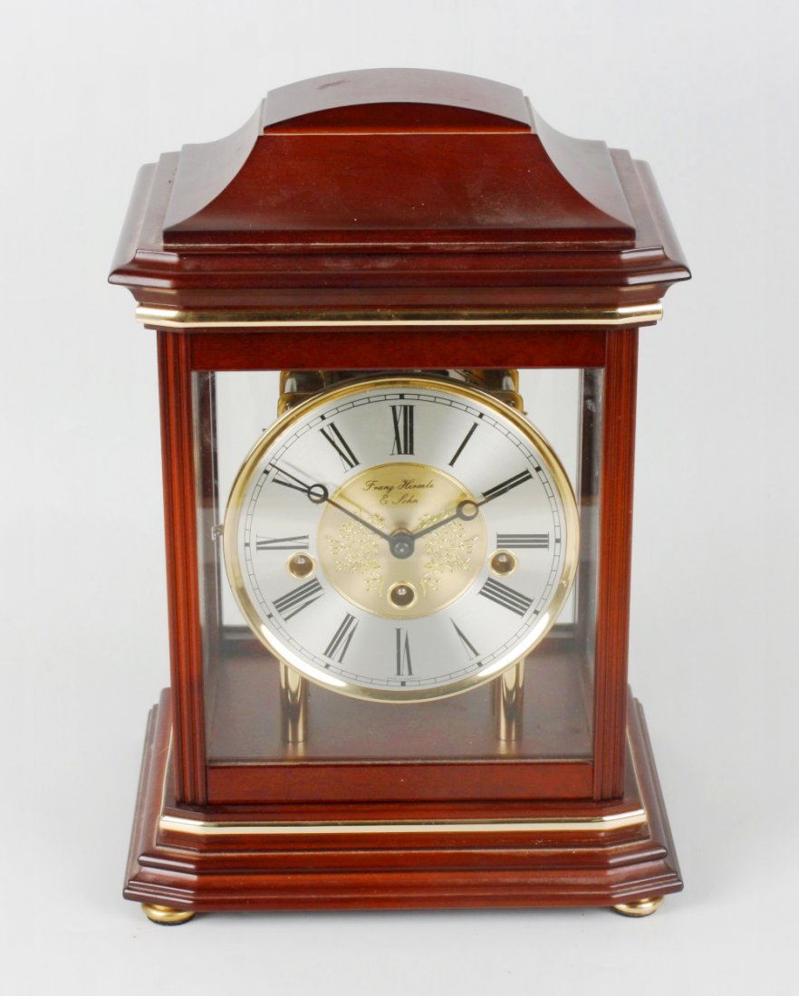 A modern Hermle mahoganycased chiming mantel clock