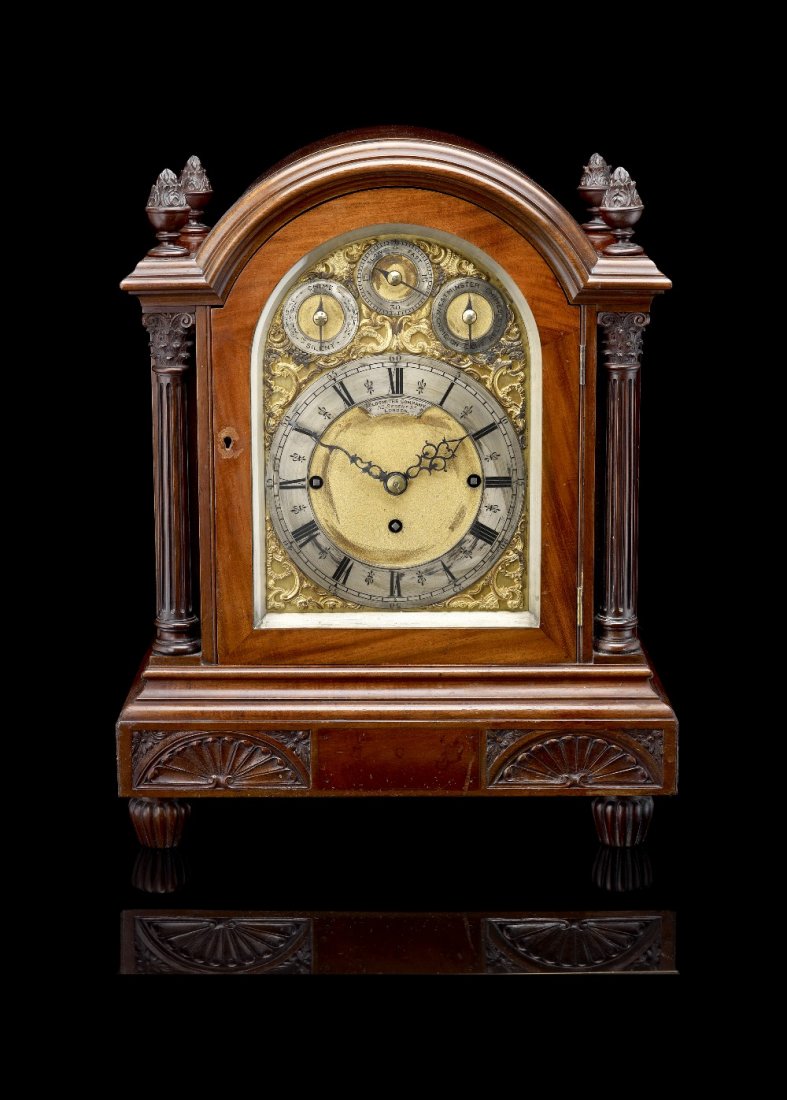 A good late Victorian/Edwardian triple-fusee chiming: A good late Victorian/Edwardian triple-fusee chiming bracket clock. Retailed by Goldsmiths Company, 112 Regent Street, London The arched brass dial with silvered chapter ring having Roman hours and Ar