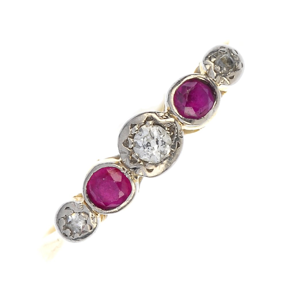 (7966) An assortment of jewellery.: (7966) An assortment of jewellery. To include seven gem-set and variously designed rings, two Figaro-link bracelets and a Figaro-link necklace. Estimated total diamond weight 0.15ct. Seven with hallma