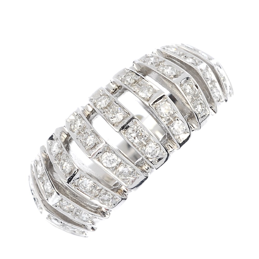 (119897) ANTONINI- a diamond dress ring.: (119897) ANTONINI- a diamond dress ring. Designed as a row of arched pave-set diamond lines, to the plain knife edge half band. Signed Antonini. Estimated total diamond weight 0.70ct. Weight 7.3gms.