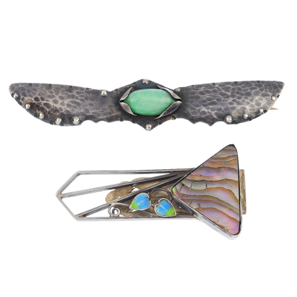 Two early-mid 20th century silver gem-set items of: A Dutch silver and paste brooch, the oval green paste cabochon to the textured wing sides, together with a shell and enamel clip. Brooch with maker's mark W.G. Bannink, Handwerk, Haarlem. Lengths 7.2