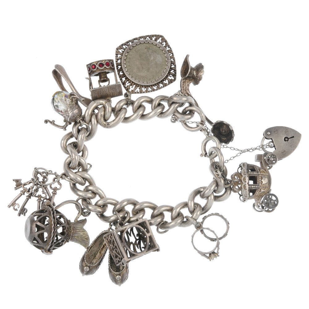 Four charm bracelets.: Four silver and white metal charm bracelets, the curb-link bracelets suspending thirty-seven charms, to include a carriage and a cuckoo clock, three with heart padlock clasps. Some with marks indicati