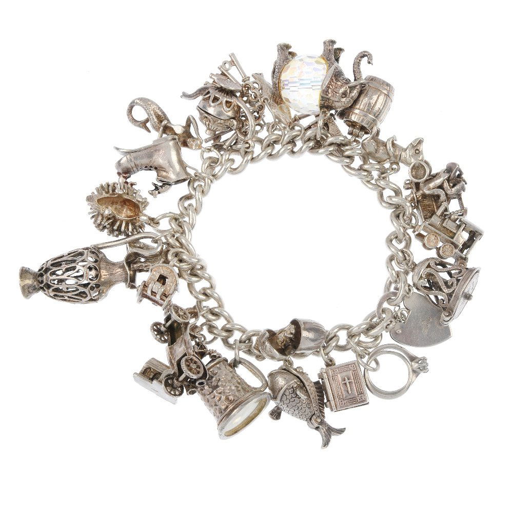 Four charm bracelets.: Four silver and white metal charm bracelets, the curb-link bracelets suspending sixty charms, to include a cash register and a wishing well, three with heart padlock clasps. Some with marks to indicat