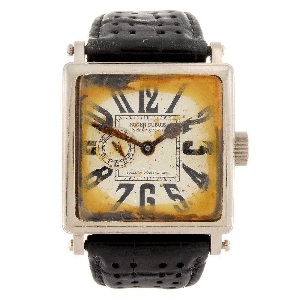 A mixed group of watches.: * A group of three various wrist watches, to include Rolex, Patek Philippe and an 18k white gold Roger Dubuis, all recommended for spares only. A/F.