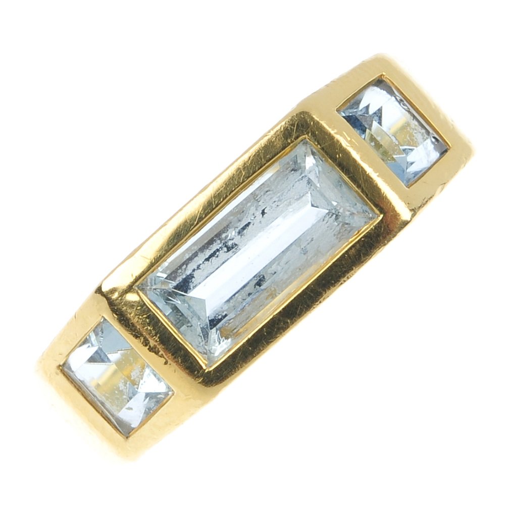 TIFFANY & CO. - an aquamarine ring by Paloma Picasso,: TIFFANY & CO. - an aquamarine ring by Paloma Picasso, for Tiffany & Co. The rectangular-shape aquamarine, with square-shape aquamarine sides, to the tapered band. Signed Tiffany & Co, Paloma Picasso. 