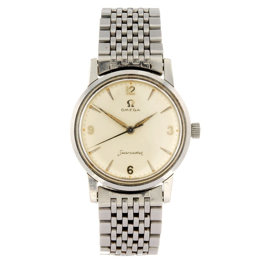 A stainless steel manual wind gentleman's Omega: OMEGA - a stainless steel manual wind gentleman's Seamaster bracelet watch, the silvered dial with applied hour markers and quarterly Arabic numerals, minute track, round case fitted to a steel link b