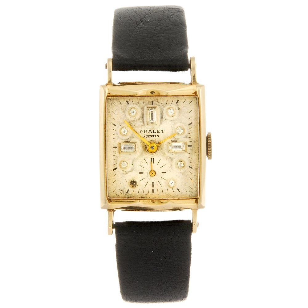 A 14k gold manual wind Chalet wrist watch.: A 14k gold manual wind Chalet wrist watch, the silvered dial with hourly applied white stone markers, subsidiary seconds dial to six o'clock, rectangular shaped case stamped 14K, fitted to a non-origi