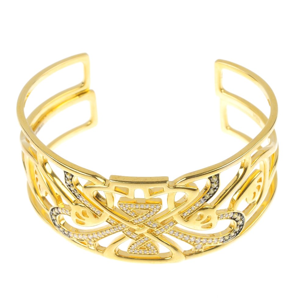 BIBA - a selection of silver bangles.: BIBA - a selection of silver bangles, to include two paste openwork half-bangles, an enamel animal print bangle, together with two further bangles. Stamped Biba. Hallmarks for London. Inner diameters