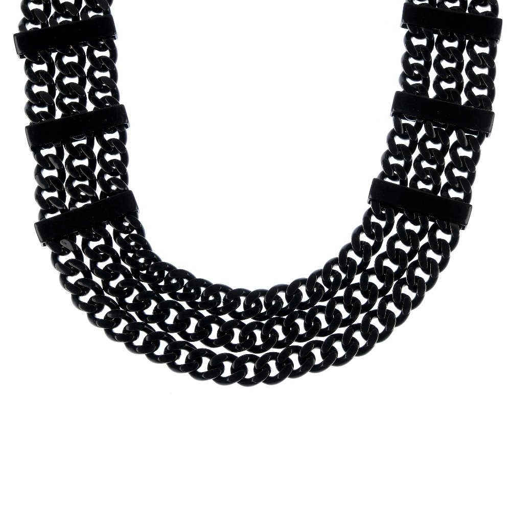 A selection of designer jewellery.: A selection of designer jewellery, to include two Burberry chain necklaces, two Thomas Sabo charms, two Swarovski rings, a Tiffany & Co. ring, a Gucci watch and a Lovelinks charm bracelet. (9) One Bur