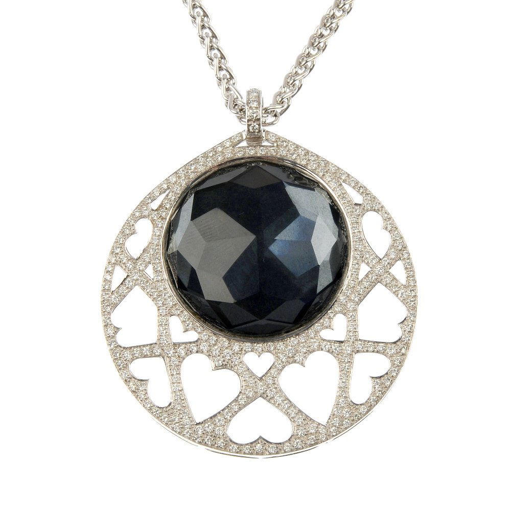 STEPHEN WEBSTER - an 18ct gold hematite and diamond: * STEPHEN WEBSTER - an 18ct gold hematite and diamond 'Love haze' pendant. The hematite and faceted quartz doublet, within a brilliant-cut diamond latticework surround, suspended from a barley-link ch
