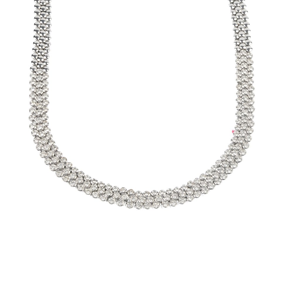 A diamond necklace and pair of ear hoops.: A diamond necklace and pair of ear hoops. The front of the necklace designed as three rows of articulated brilliant-cut diamond collets, to the circular-link back chain, the ear hoops pave-set with br