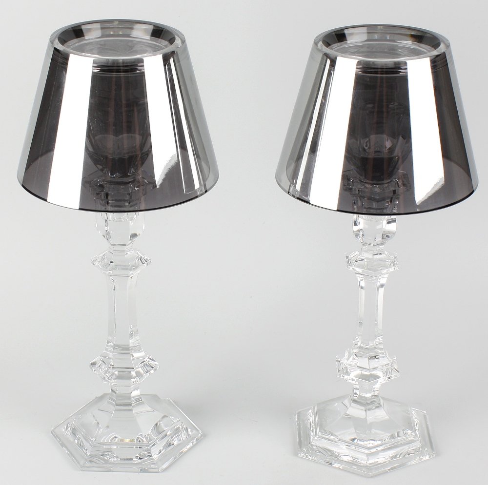 A pair of 20th century Baccarat glass candlesticks: A pair of 20th century Baccarat glass candlesticks, each with hexagonally-facetted funnel reservoir and tinted shade over hexagonal socket, stem and base, each marked 'Baccarat by Starck Flos Tech 930