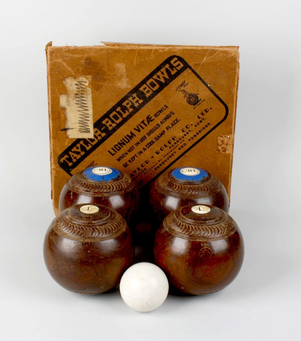 A set of four Taylor-Rolph Lignum Vitae bowling woods: A set of four Taylor-Rolph Lignum Vitae bowling woods, with Jack in original box, together with associated carry bag.