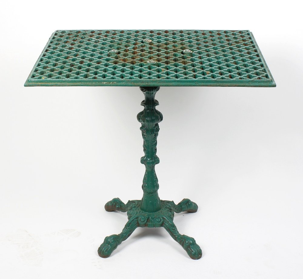 Two cast iron garden tables: Two cast iron garden tables, the shaped bases with applied cast metal 'grate' tops, plus a garden bench with cast iron ends and central support, a cast iron treadle operated sewing machine frame, heav