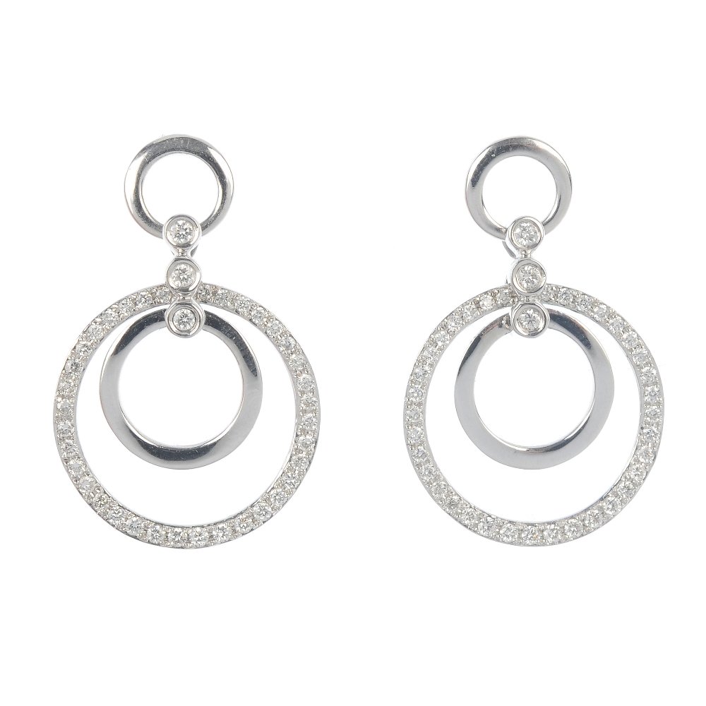 A pair of 18ct gold ear pendants.: A pair of 18ct gold ear pendants. Each designed as an articulated hoop within a brilliant-cut diamond circle, to the similarly-cut diamond line and circular surmount. Estimated total diamond weight 0.