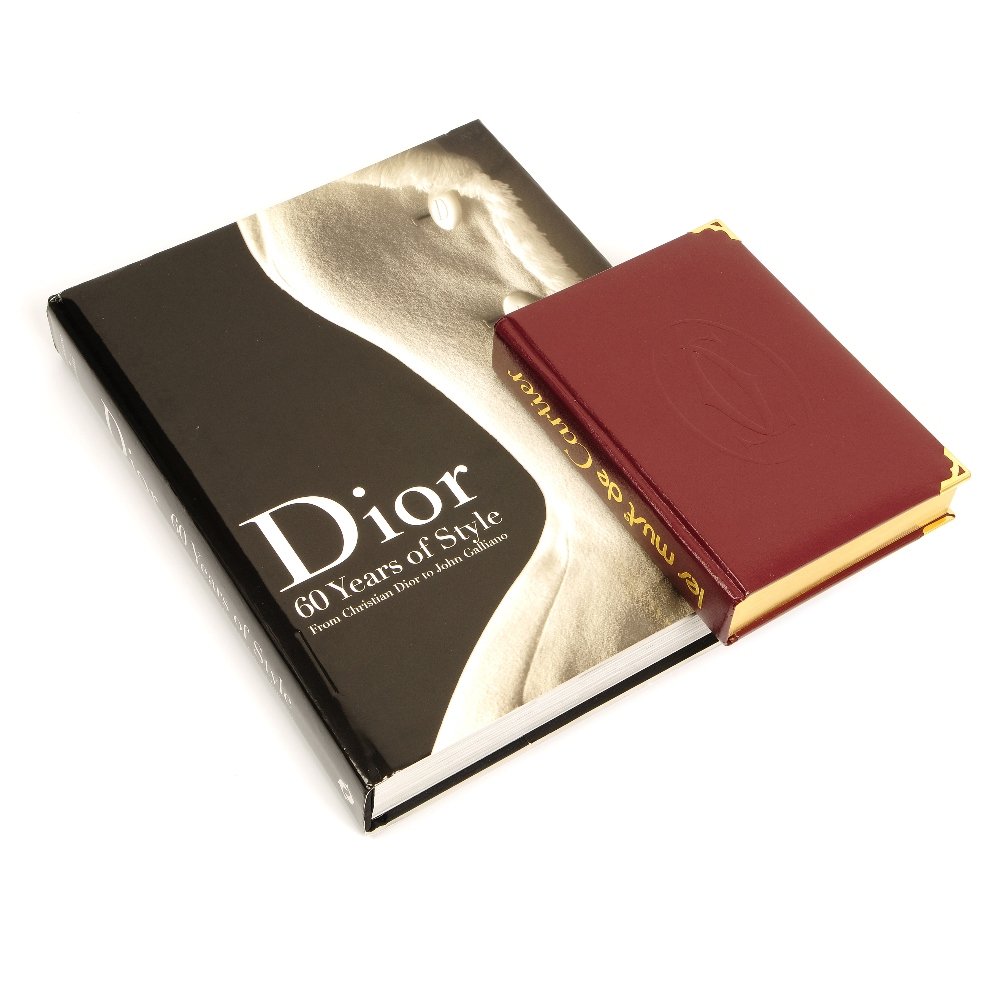 A Christian Dior and a Cartier book.: Two hardback books to include, 'Dior: 60 Years of Style: From Christian Dior to John Galliano' by Farid Chenoune and Laziz Hamani, together with 'Les Must De Cartier' by Anne-Marie Clais, with gilt ed