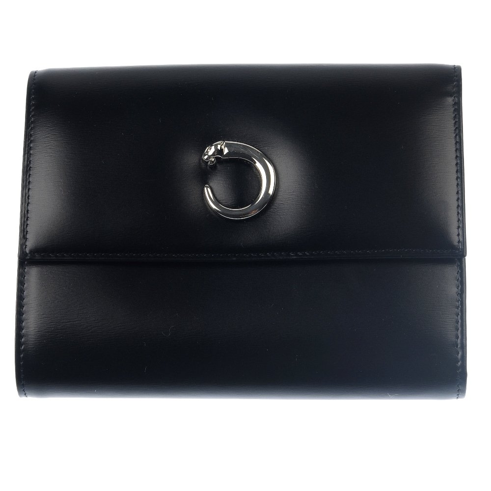 CARTIER - a purse. With maker's case.: CARTIER - a black, calf leather purse with a flap top, snap button closure, silver-tone hardware featuring maker's panther logo and multiple interior compartments. With maker's care card and box. Meas