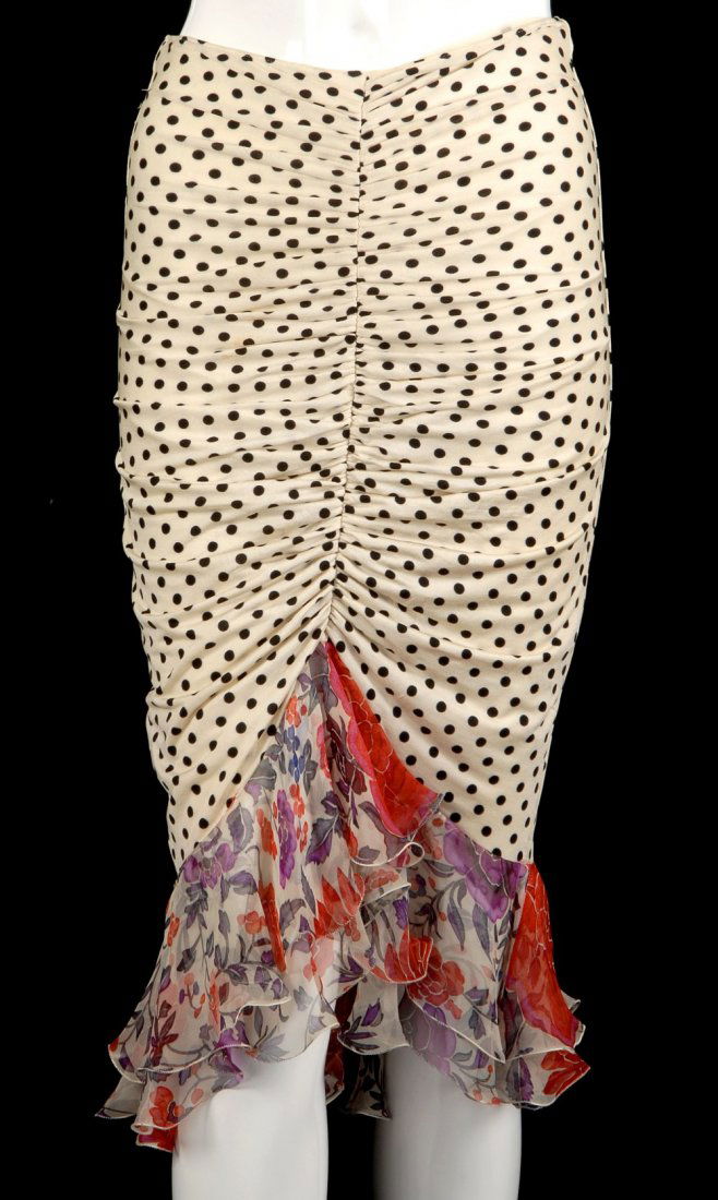 Two items of designer clothing: Two items of designer clothing to include a Prada ivory silk top, the sleeveless round neck collar gathered to the frilled empire line together with an Emanuel Ungaro polka-dot cocktail skirt. Size 38