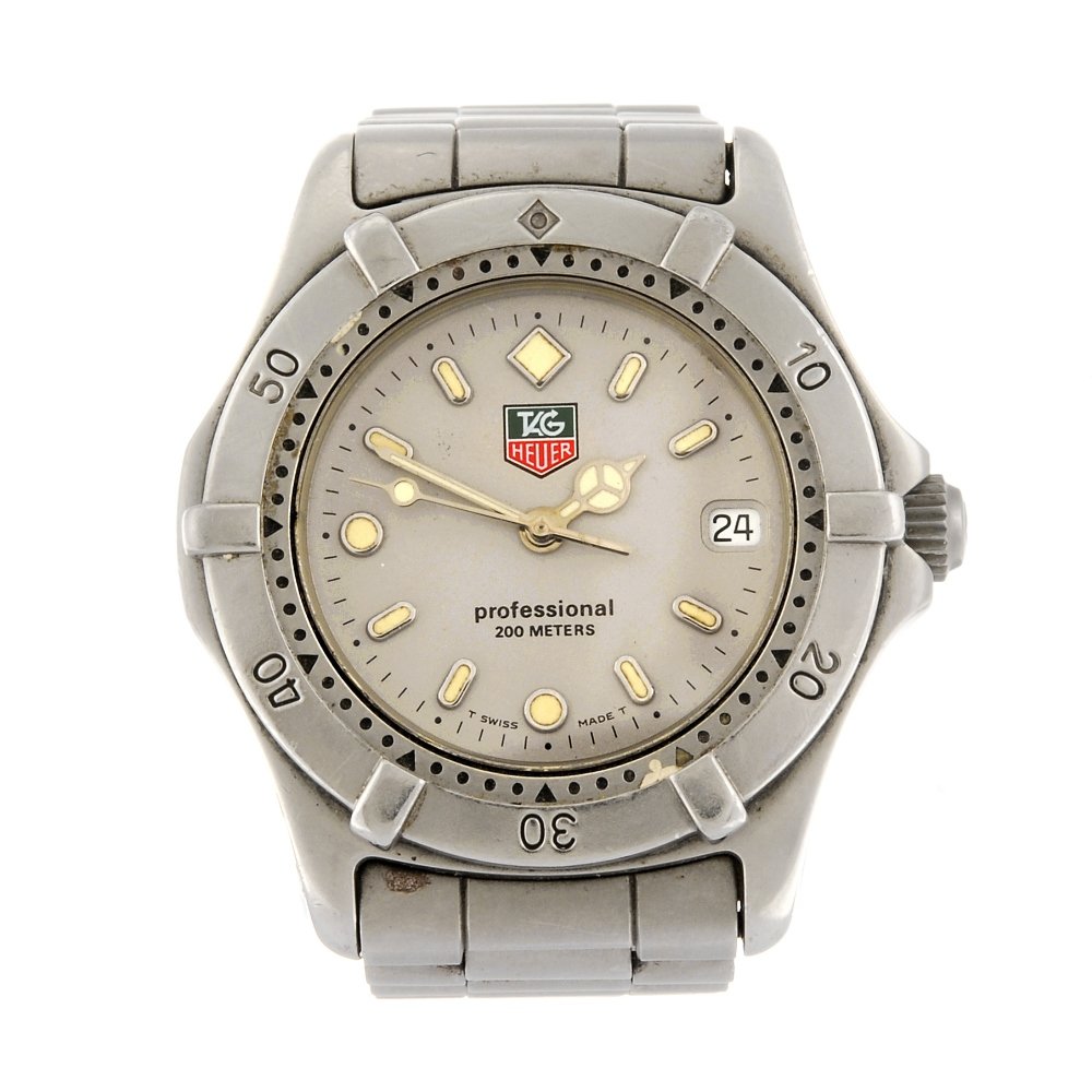 TAG HEUER - a mid-size 2000 Series bracelet watch.: TAG HEUER - a mid-size 2000 Series bracelet watch. Reference WE1211-R, number T13653. Signed quartz movement. Silvered dial with luminous hour markers, date aperture to three. Calibrated bezel, stainl