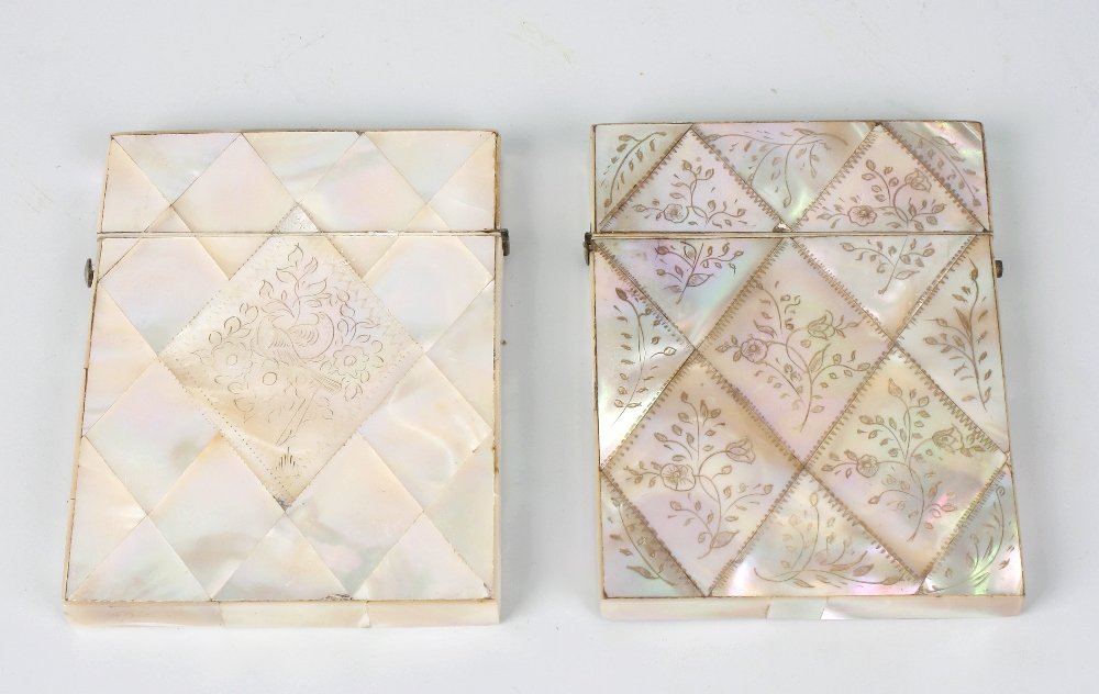 Two mother of pearl and abalone shell visiting card cas: Two mother of pearl and abalone shell visiting card cases, each having lozenge-shaped panels, one with large incised central panel, the cover with all over incised floral decoration to each side, each