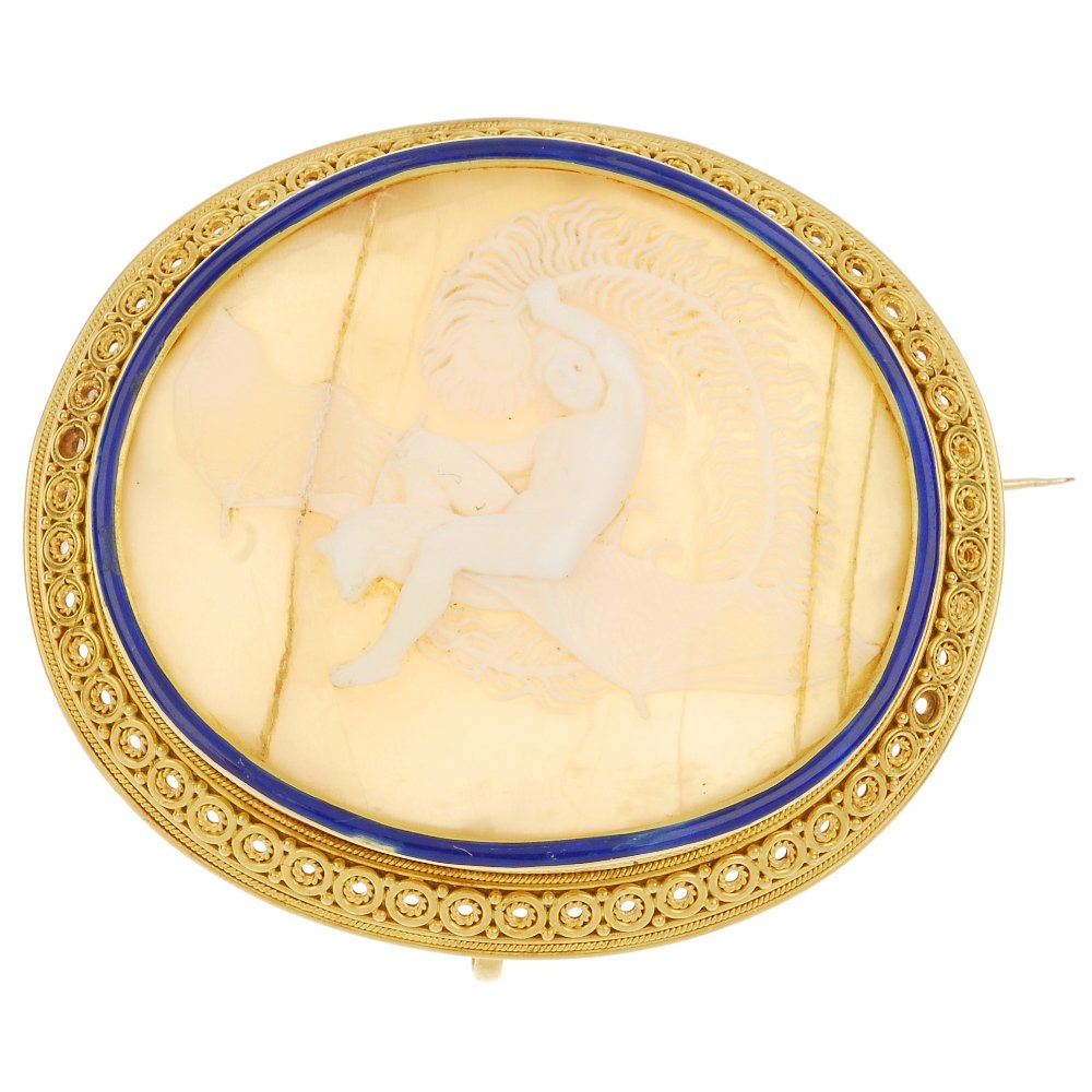 A late 19th century gold enamel shell cameo brooch.: A late 19th century gold enamel shell cameo brooch. Carved to depict Ariel flying on a bat's back, holding a peacock's feather, to the blue enamel and cannetille surrounds. Shell signed T Saulini F. L