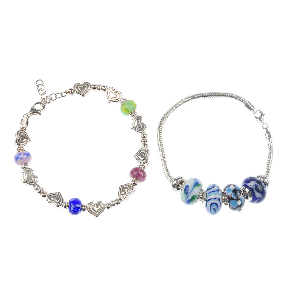 A selection of bracelets and charm bracelets.: A selection of bracelets and charm bracelets, to include a heart and glass bead bracelet, together with further items of jewellery. Most with marks to indicate silver. Gross weight 725gms.
