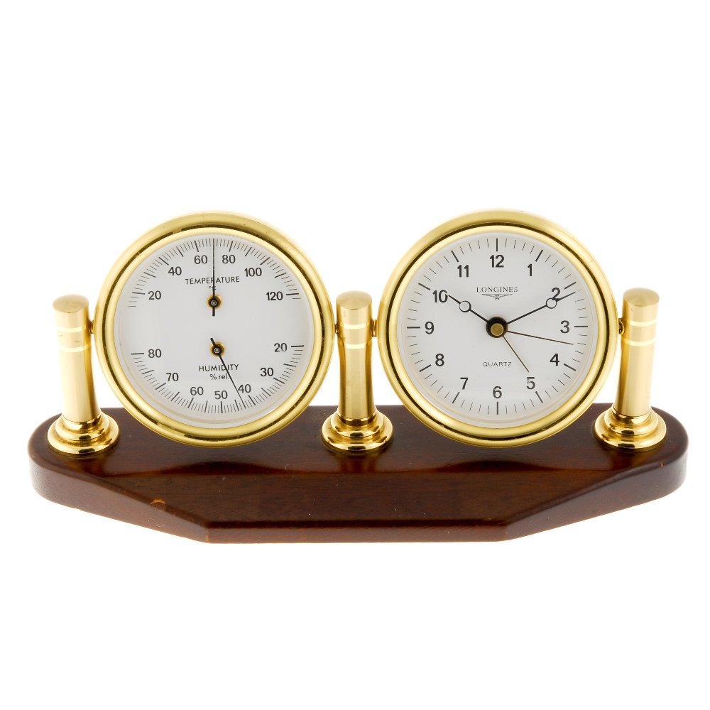 A desk clock and barometer by Longines.